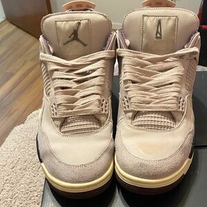 Air Jordan 4 Retro Sneakers in Cream and Purple